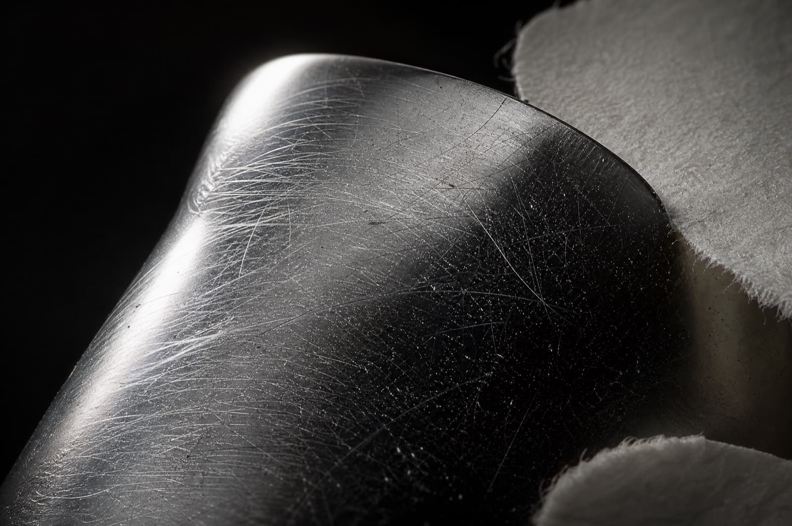 Macro of diamond drag on polished silver